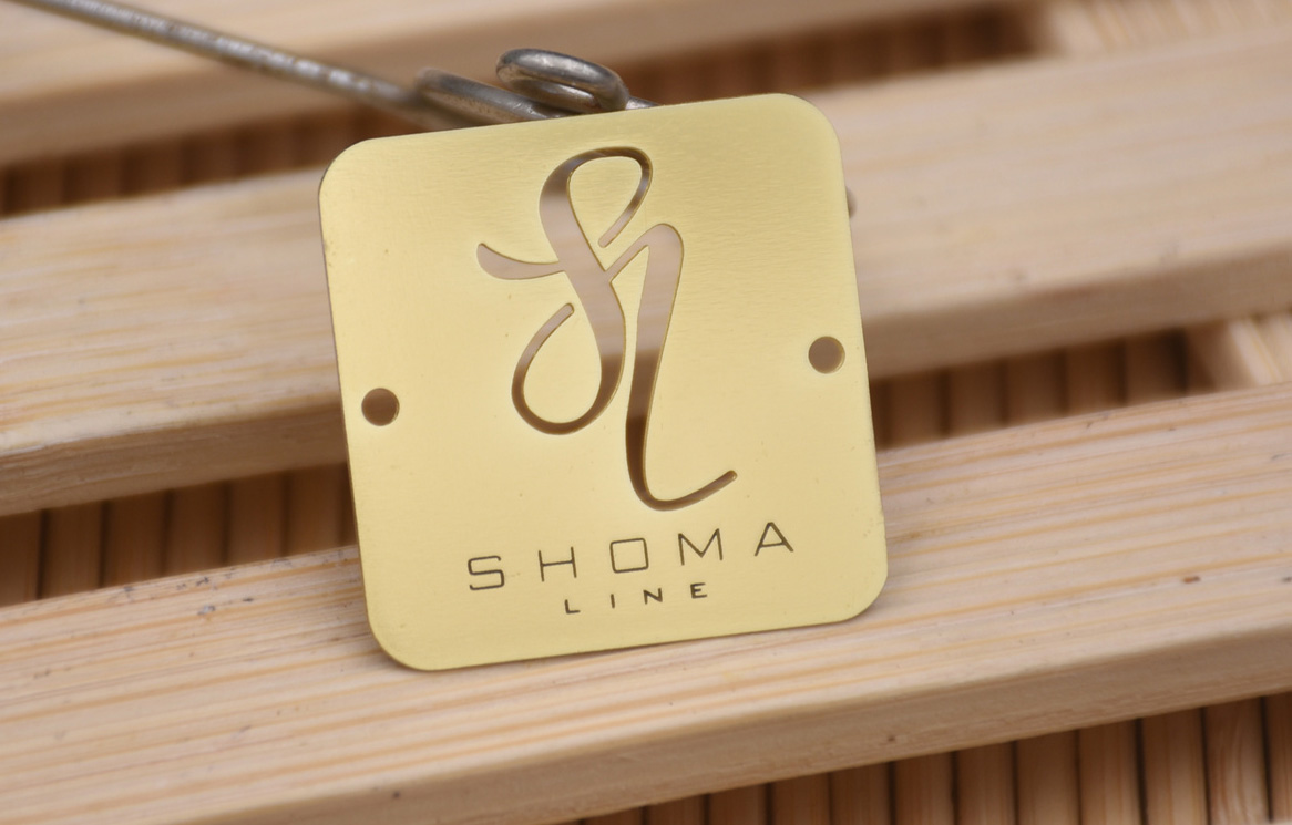 Glossy gold metal tag, cutout