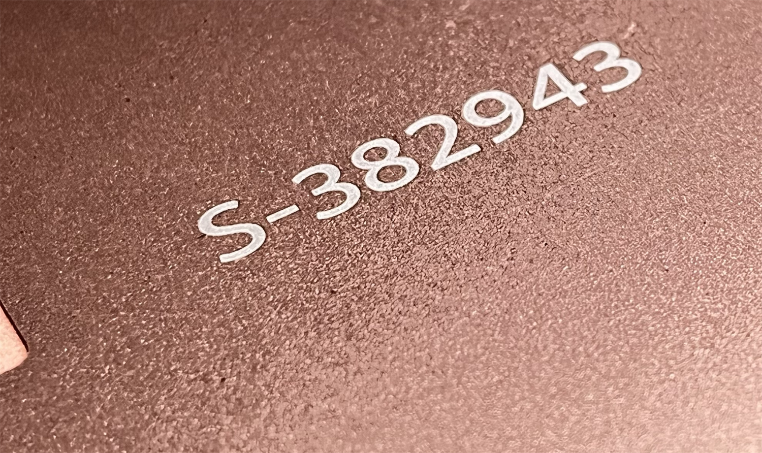 laser engraved number on rose gold